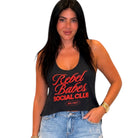 Woman wearing a black tank top with 'Rebel Babes Social Club' text on a white background