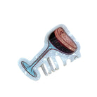 Decorative comb with a blue and white handle and red top on a white background