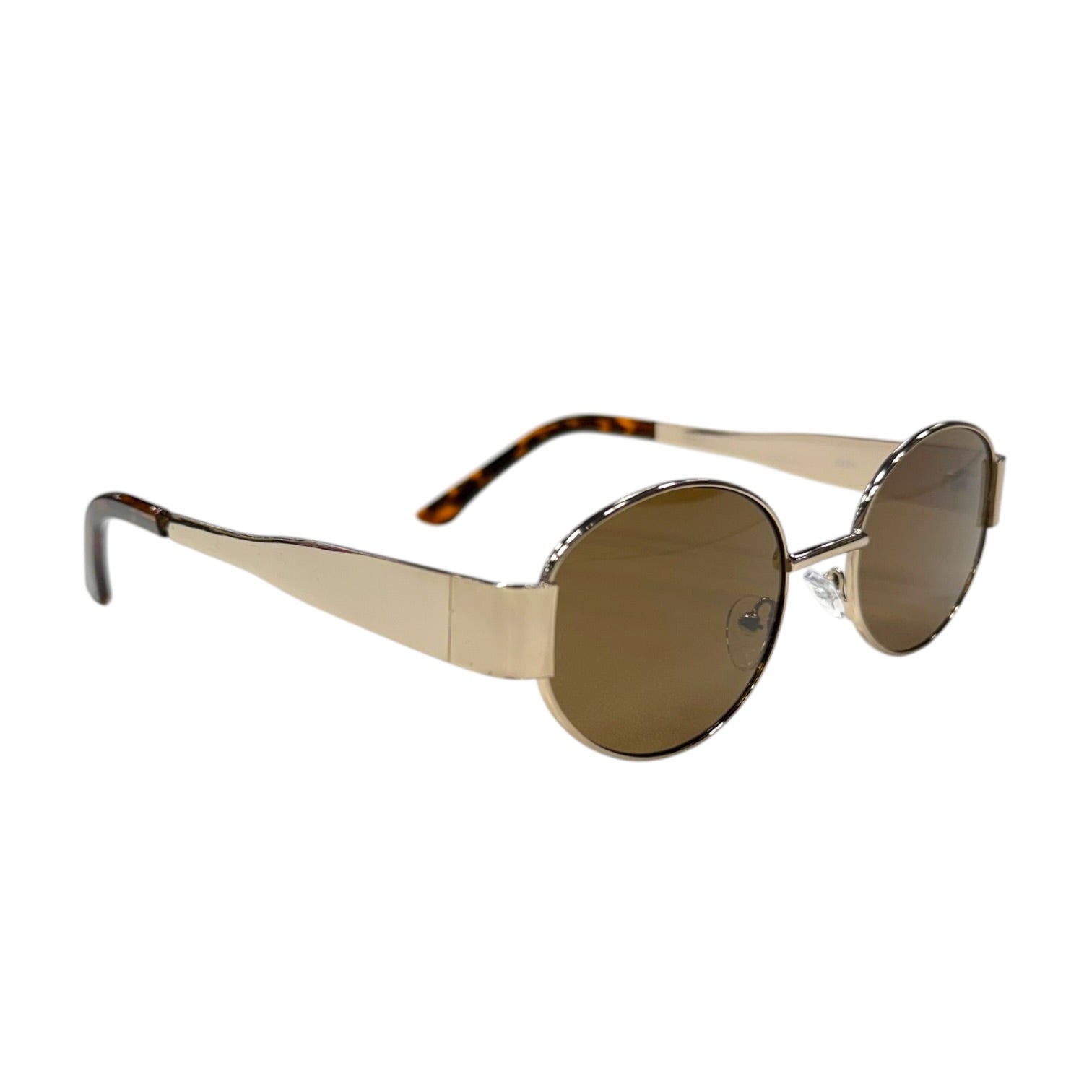 Sunglasses with gold frame and dark lenses on a white background