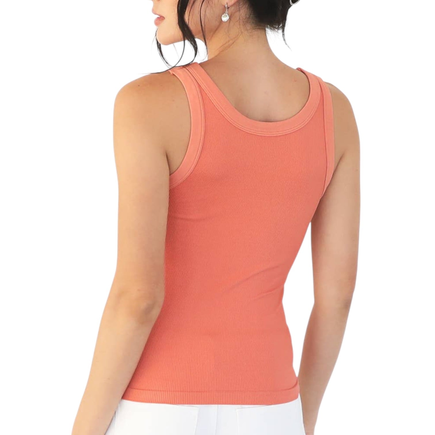 Coral tank top worn by a person on a white background