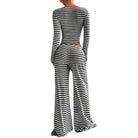 Black and white striped jumpsuit on a white background