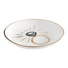 Decorative plate with a diamond design on a white background