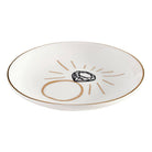 Decorative plate with a diamond design on a white background