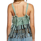 Light green tank top with fringes and open back on a white background
