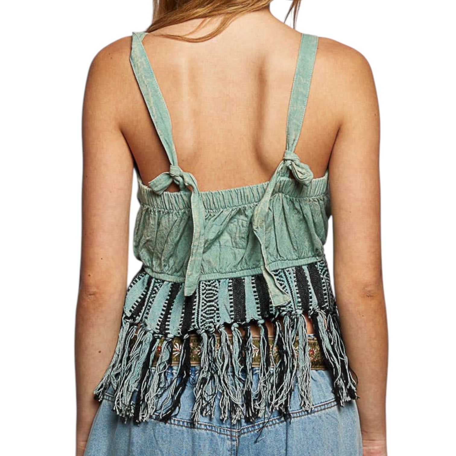 Light green tank top with fringes and open back on a white background