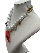 pearl  and chain necklace with crab, cherry, strawberry, coin and shell