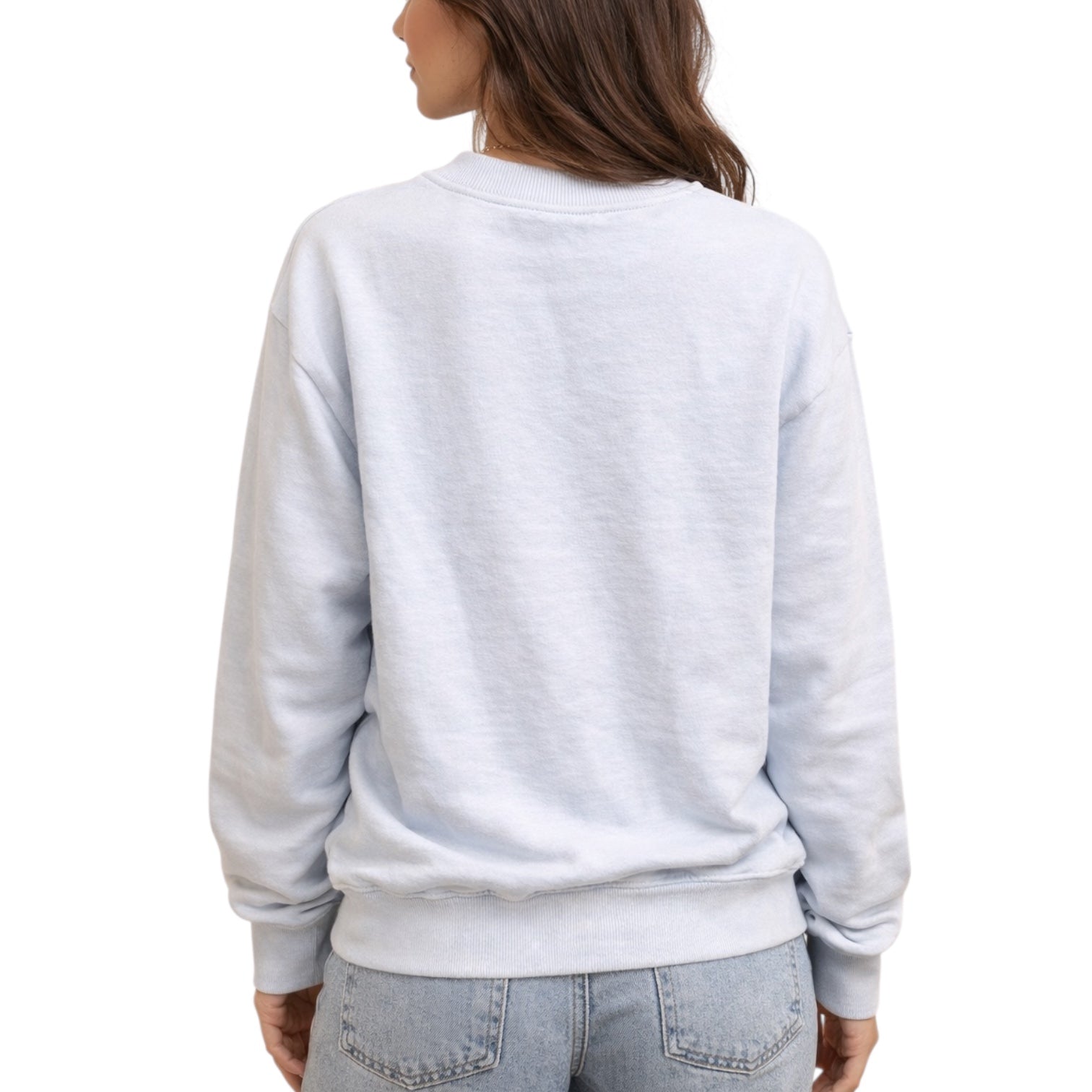 Person wearing a light blue sweatshirt on a white background