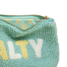 Teal furry pouch with 'SALTY' text on a white background