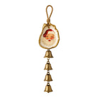 A vintage-style Christmas ornament shaped like an open oyster shell with a painted Santa Claus face and four dangling gold bells below, shown on a plain white background.