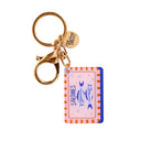 Keychain with a card design featuring fish illustrations on a white background