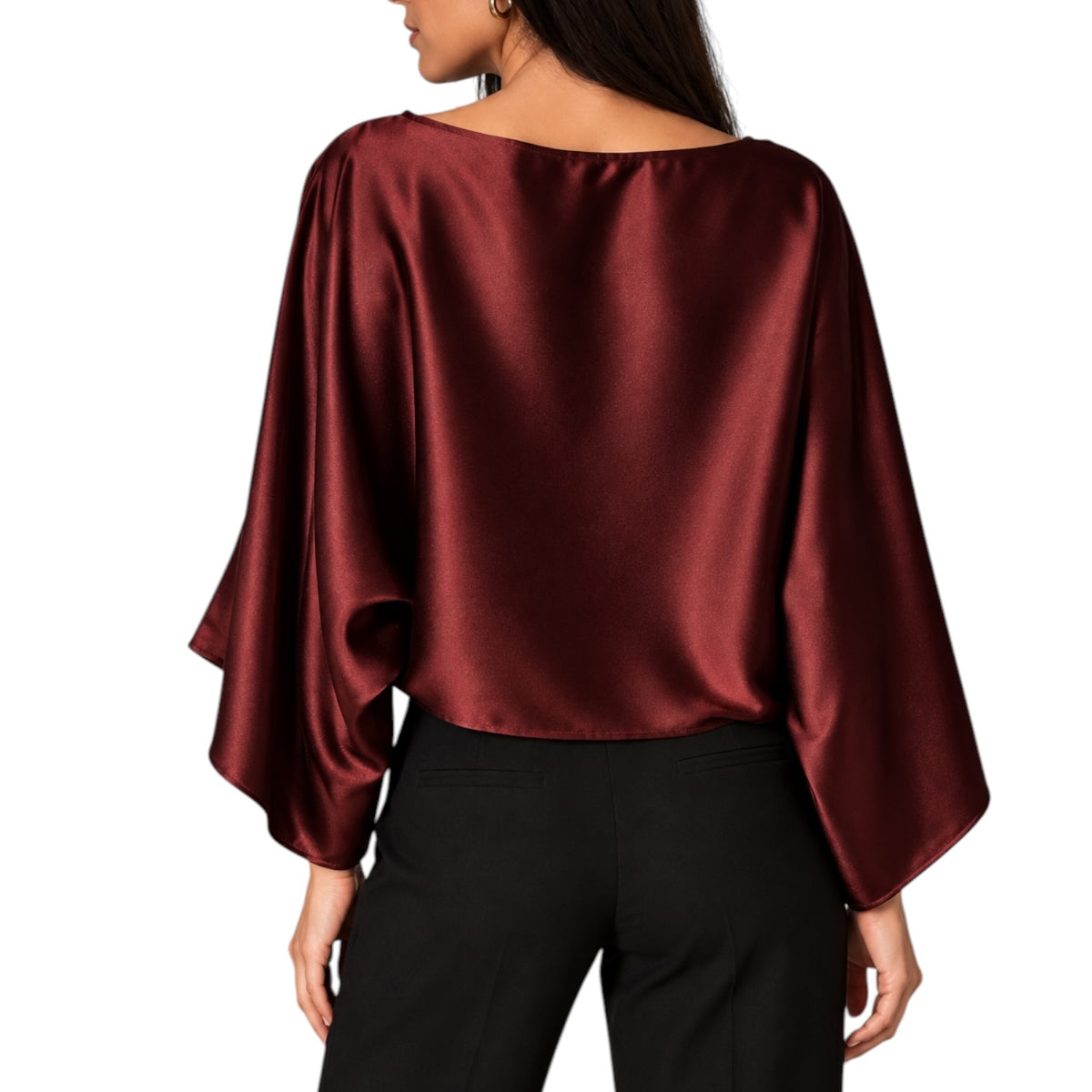 A woman shown from the back wearing a draped, wide-sleeved satin top in deep burgundy with black pants, against a plain white background.