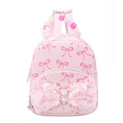 Pink backpack with bow pattern on a white background