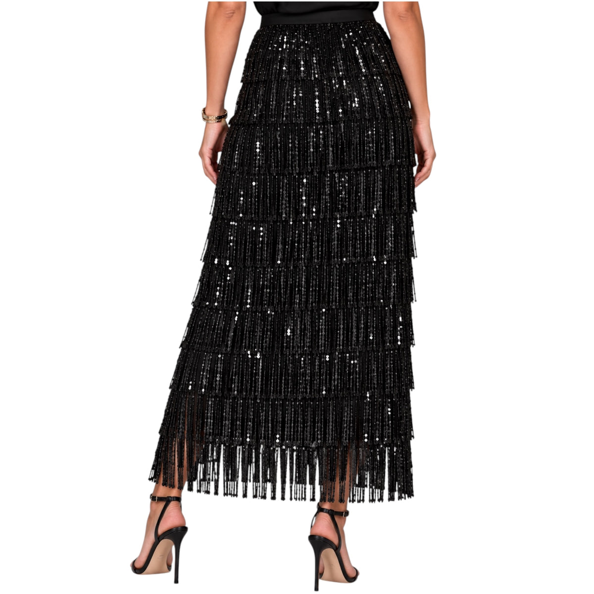 A black sequined maxi skirt with cascading fringe and tiered layers, shown on a model from the back against a plain white background.