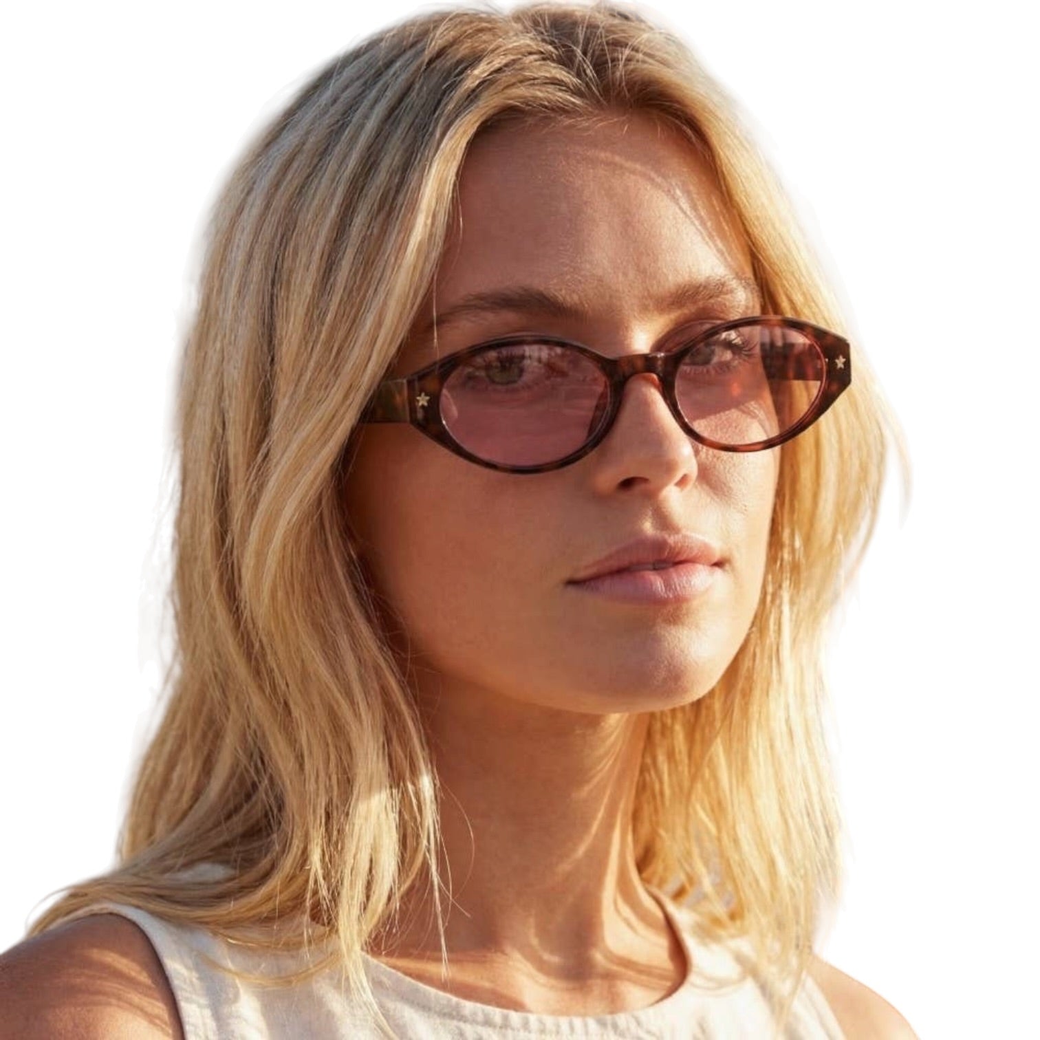 Woman wearing sunglasses with a plain background