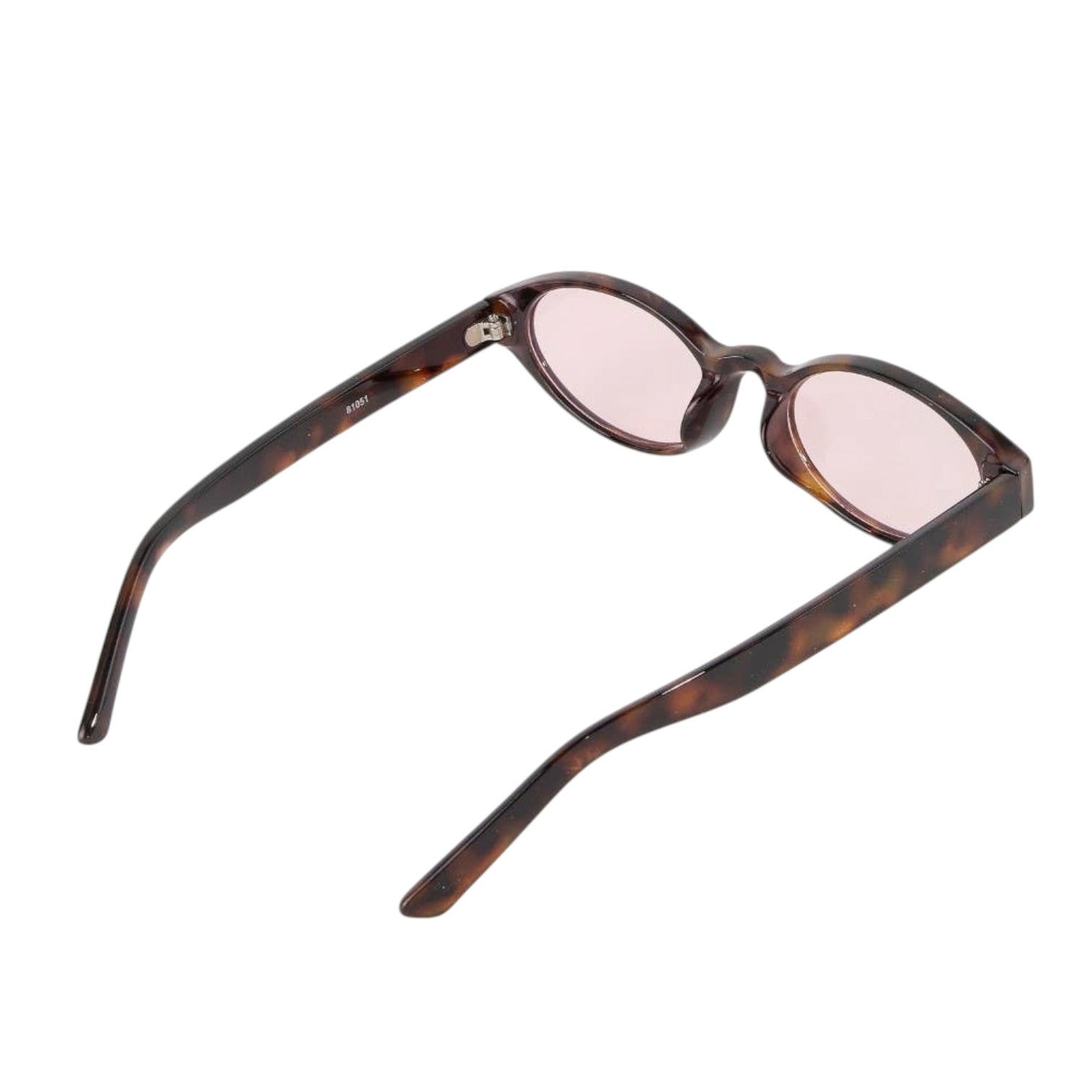 Tortoiseshell-framed eyeglasses with pink lenses on a white background