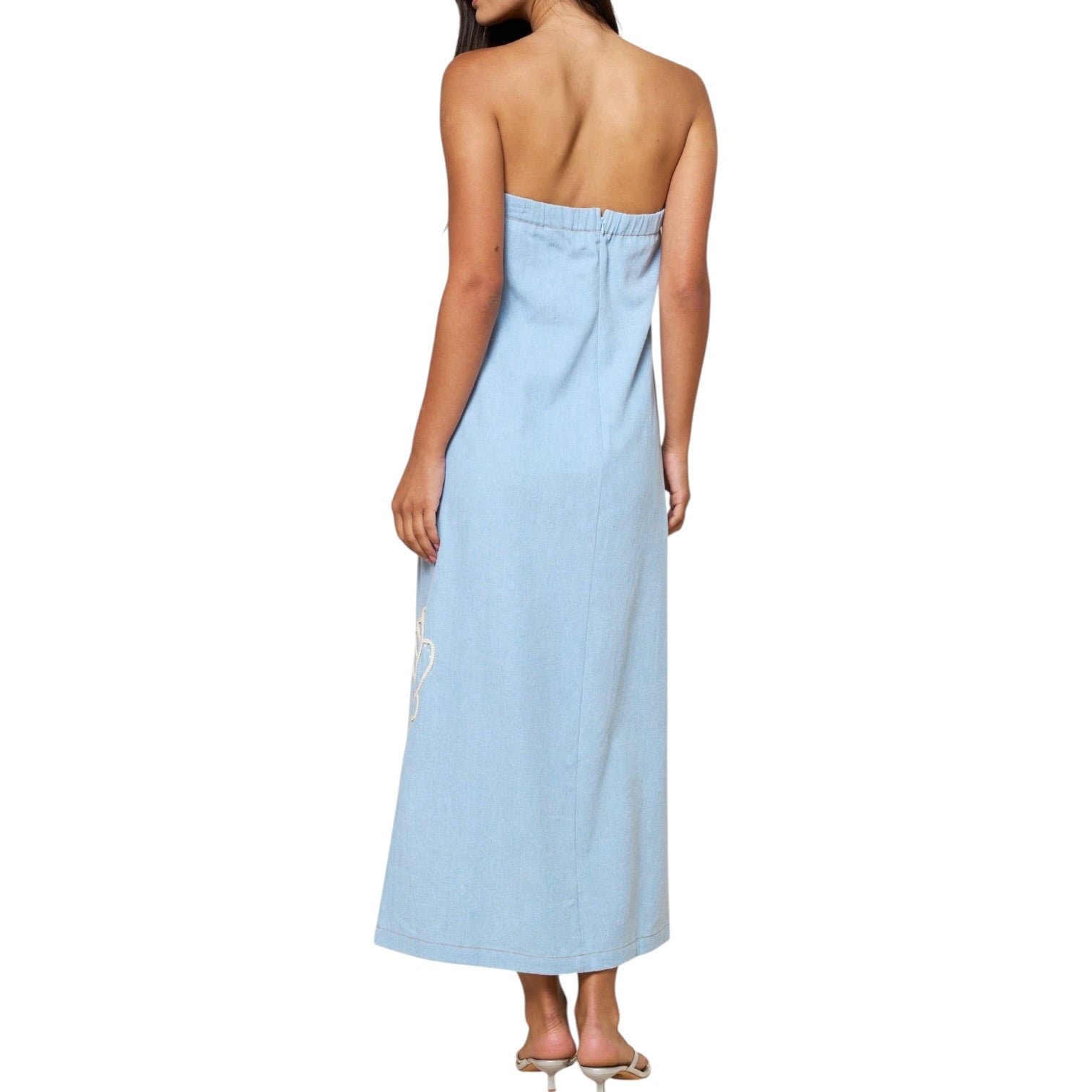 Light blue strapless dress worn by a model on a white background