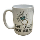 White mug with a diamond ring graphic and text on a white background