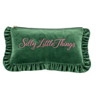 A green velvet pouch with ruffled trim and pink embroidered text reading 'Silly Little Things' on a white background.