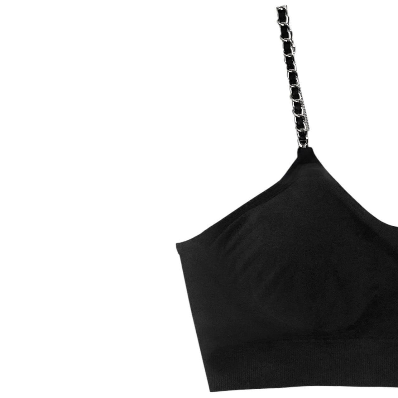 Black crop top with chain strap on a white background