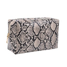 A rectangular zippered cosmetic pouch featuring a beige, gray, and black snakeskin pattern, with a small gold zipper pull on the left side, shown against a plain white background.