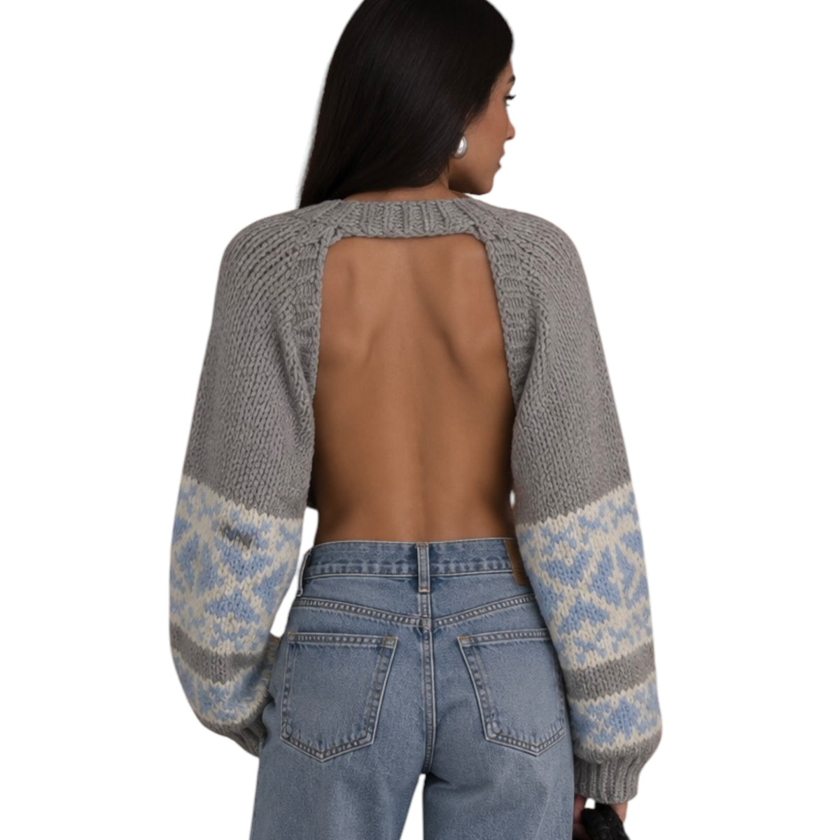 A woman shown from the back wearing a gray open-back knit sweater with light blue and white patterned sleeves, paired with light-wash blue jeans, against a plain white background.
