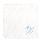 White napkin with blue text 'Something Blue' on a white background