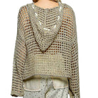 Crocheted sweater with openwork design on a white background