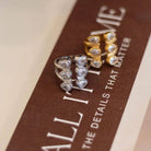 cluster silver, on a brown surface with text.