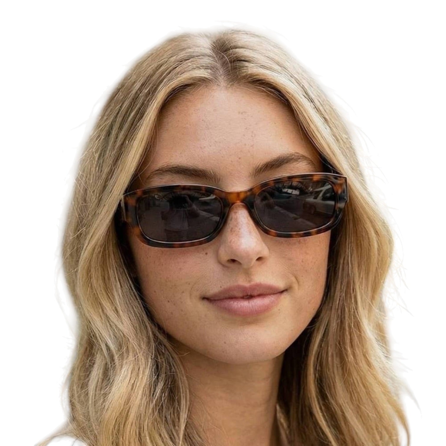 Woman wearing tortoiseshell sunglasses on a white background