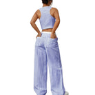 Person wearing a blue and white striped outfit on a white background