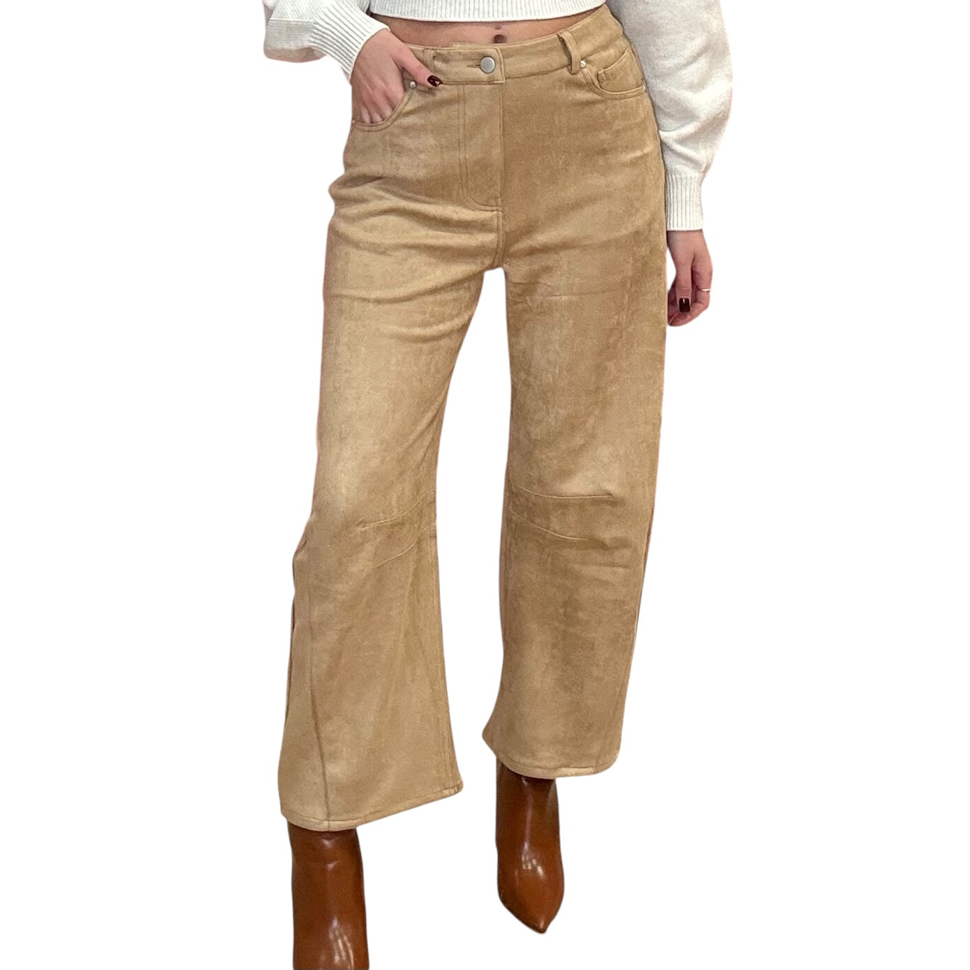 Camel suede pants worn by a person on a white background