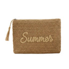 Woven pouch with 'Summer' text on a beach setting