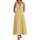 Woman wearing a yellow dress on a white background