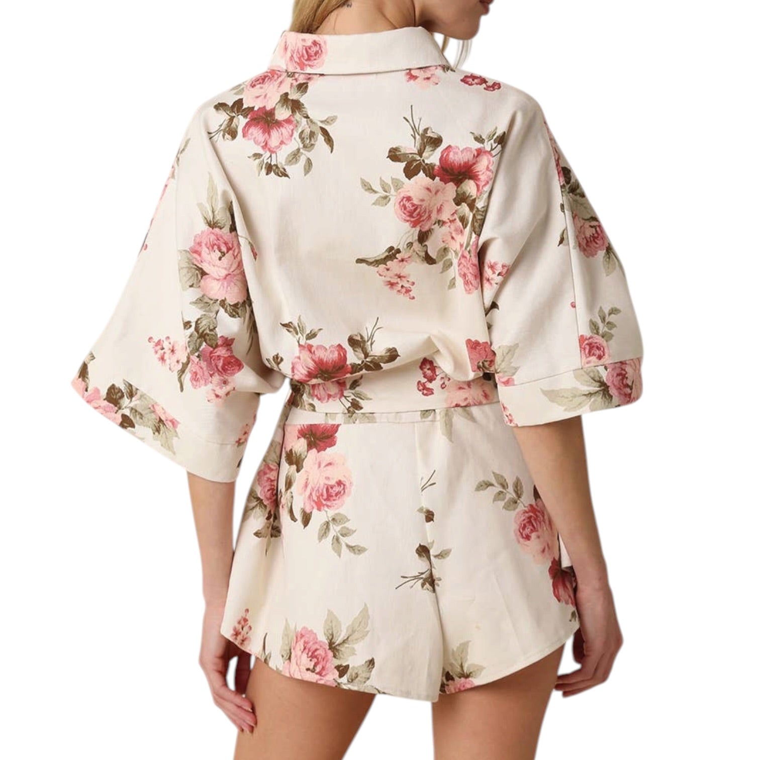 Floral patterned outfit on a white background