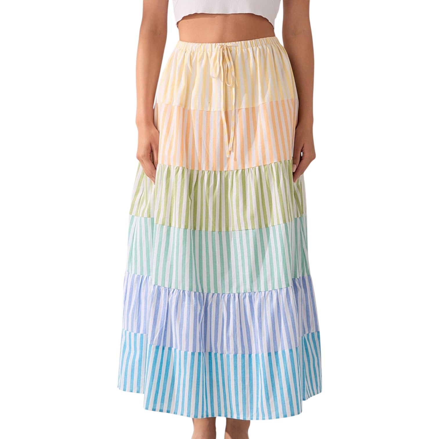 Multicolored striped skirt worn by a person on a white background