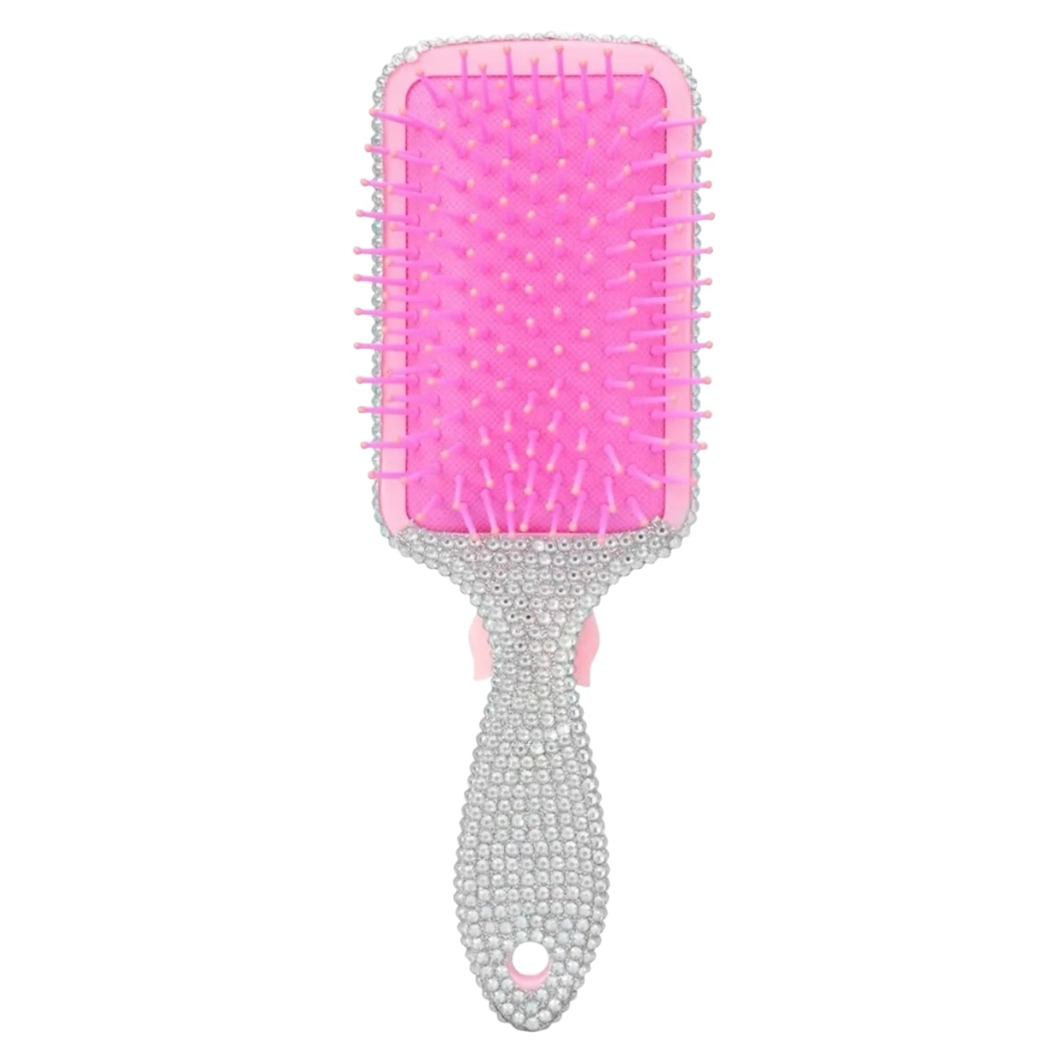 A pink hairbrush adorned with sparkling silver rhinestones on the handle and bristle edges, set against a plain white background.