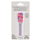 A clear rectangular lip gloss tube filled with silver glitter, topped with a colorful sprinkle-patterned cap featuring pink rhinestones and multicolored beads, shown on a white background.