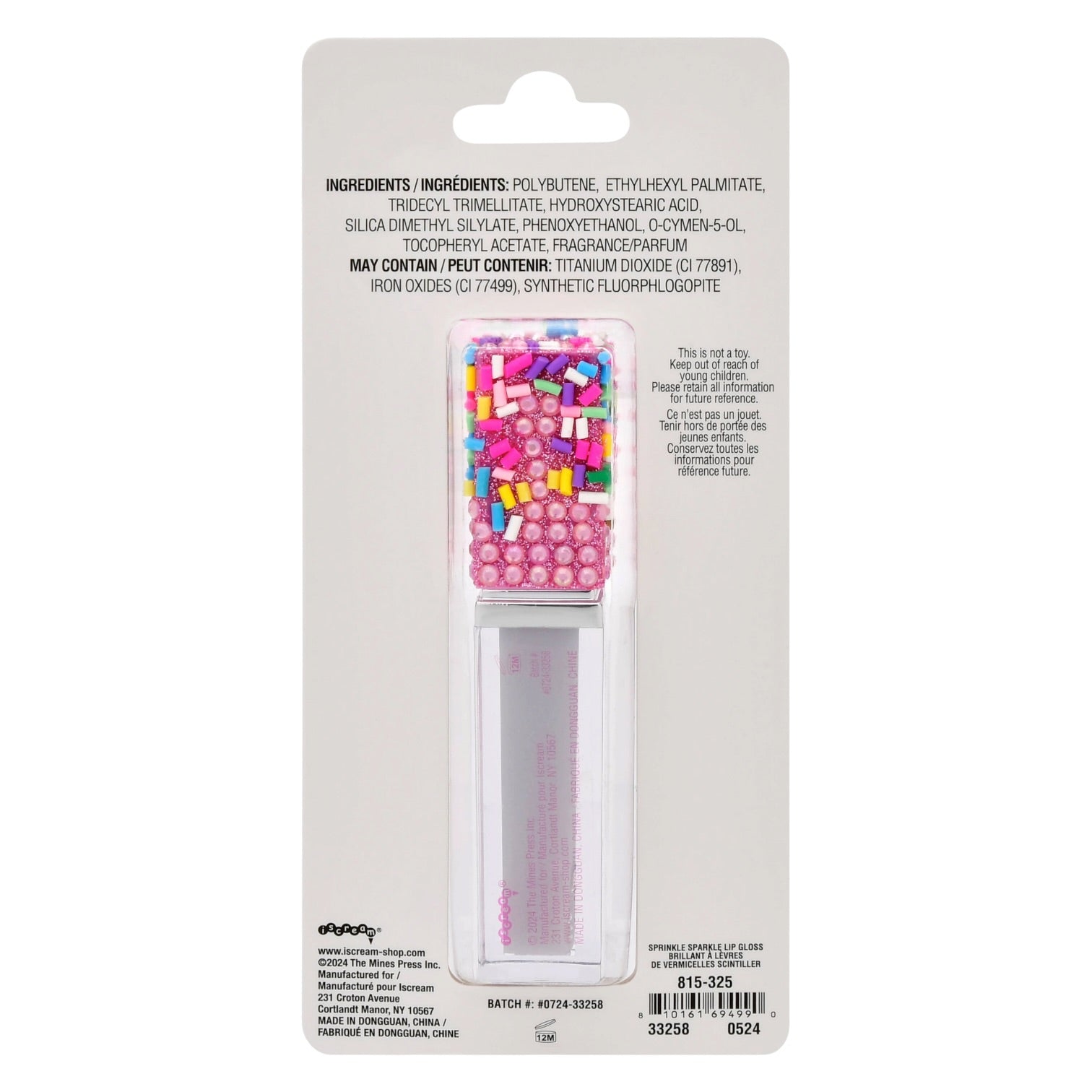 A clear rectangular lip gloss tube filled with silver glitter, topped with a colorful sprinkle-patterned cap featuring pink rhinestones and multicolored beads, shown on a white background.