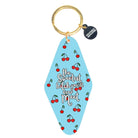 Keychain with cherry design and text on a blue background
