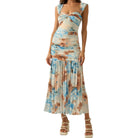 Woman wearing a floral dress on a white background