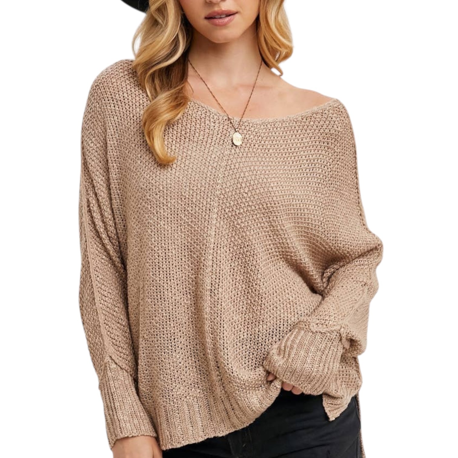 Woman wearing a beige knitted sweater on a white background