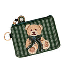 A green beaded coin purse featuring a teddy bear motif with a striped scarf, complete with a gold-tone key ring attachment.