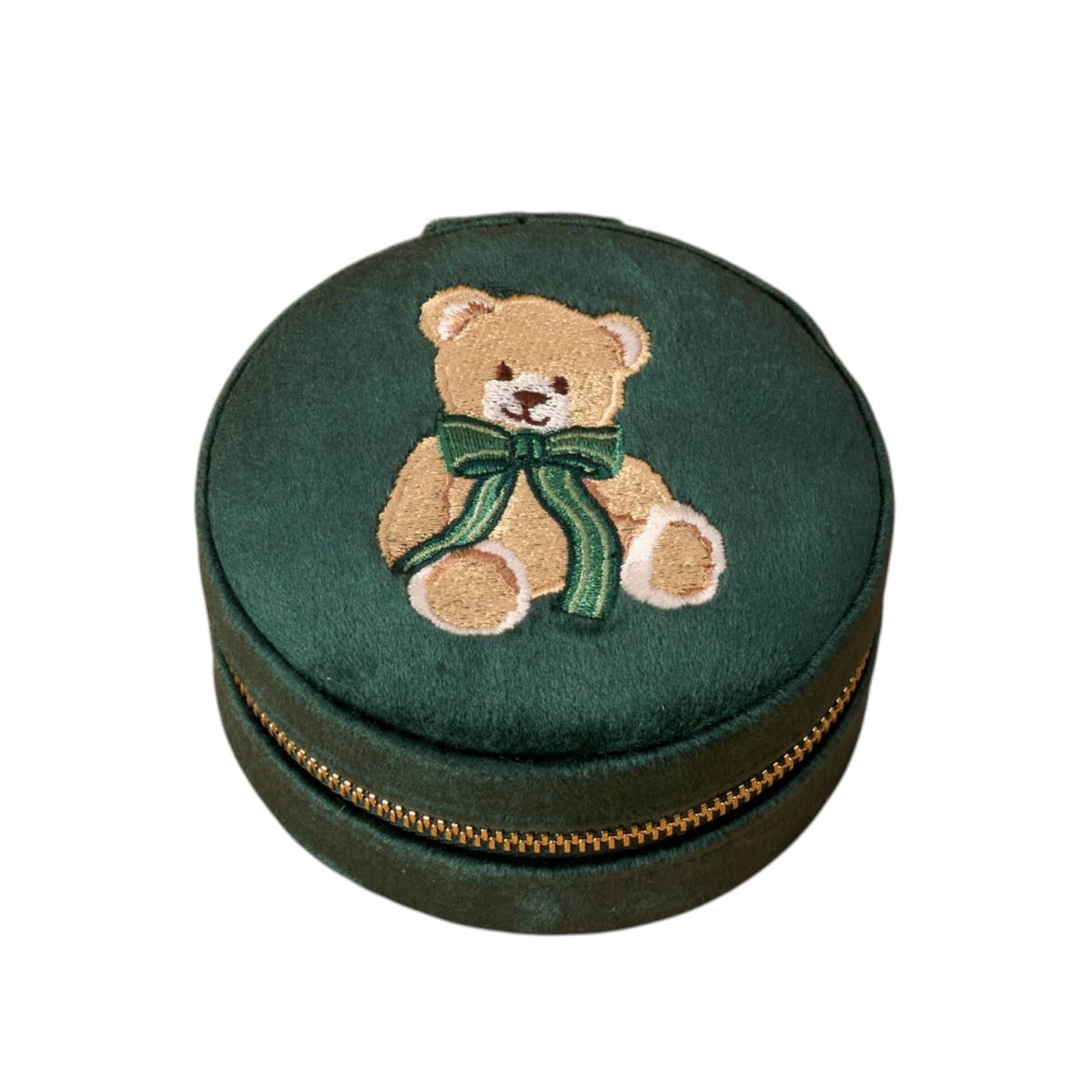 A round dark green velvet zipper case featuring an embroidered teddy bear with a green bow on top, set against a plain white background.