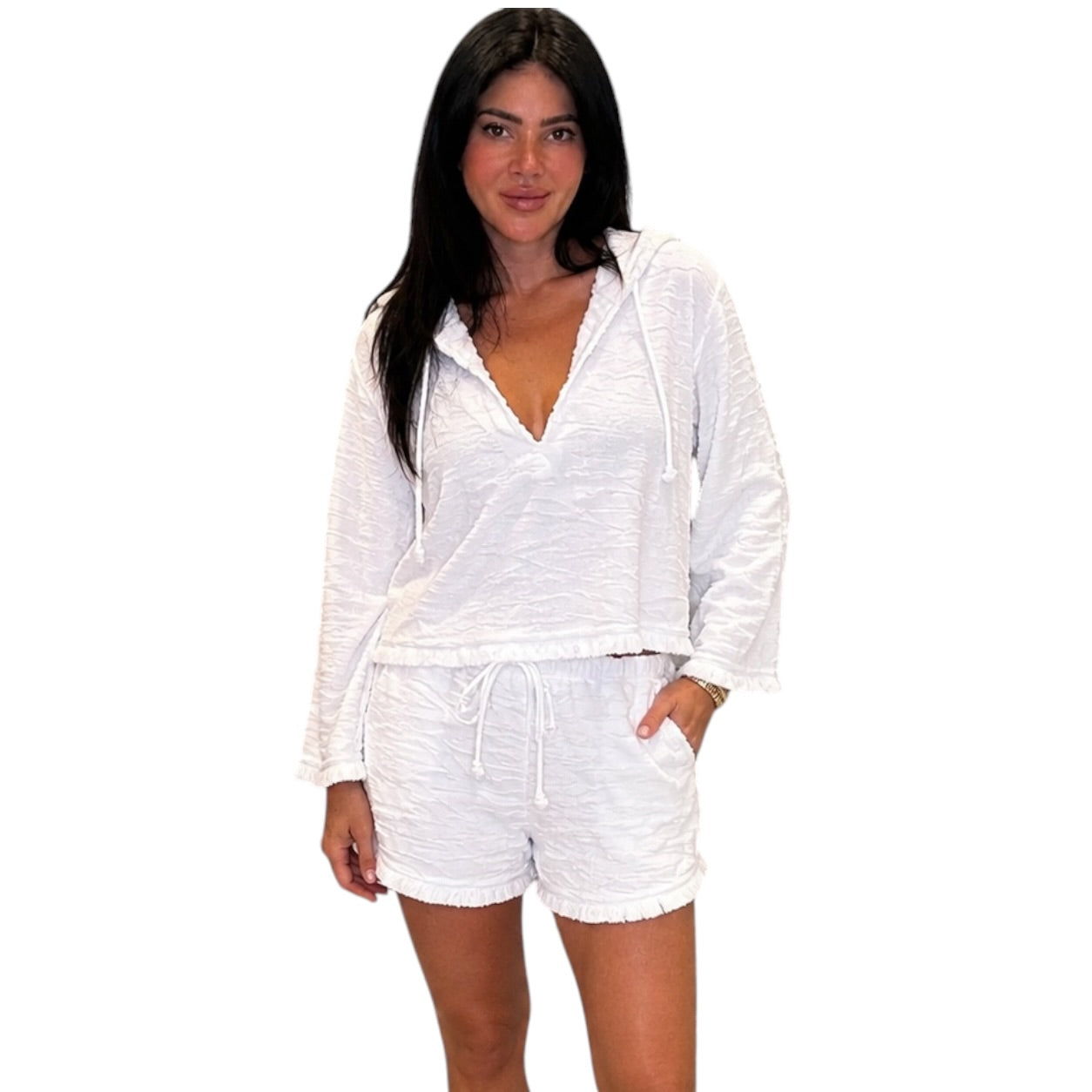 Woman wearing a white outfit on a white background