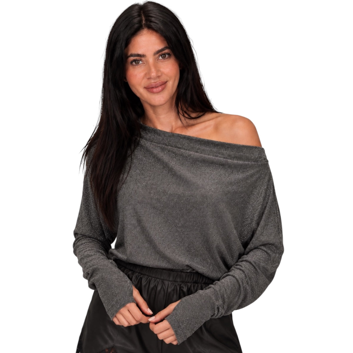 A woman modeling a dark gray off-the-shoulder long-sleeve knit top against a plain white background.