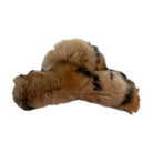Fur claw clip resembling a cat's tail on a white background