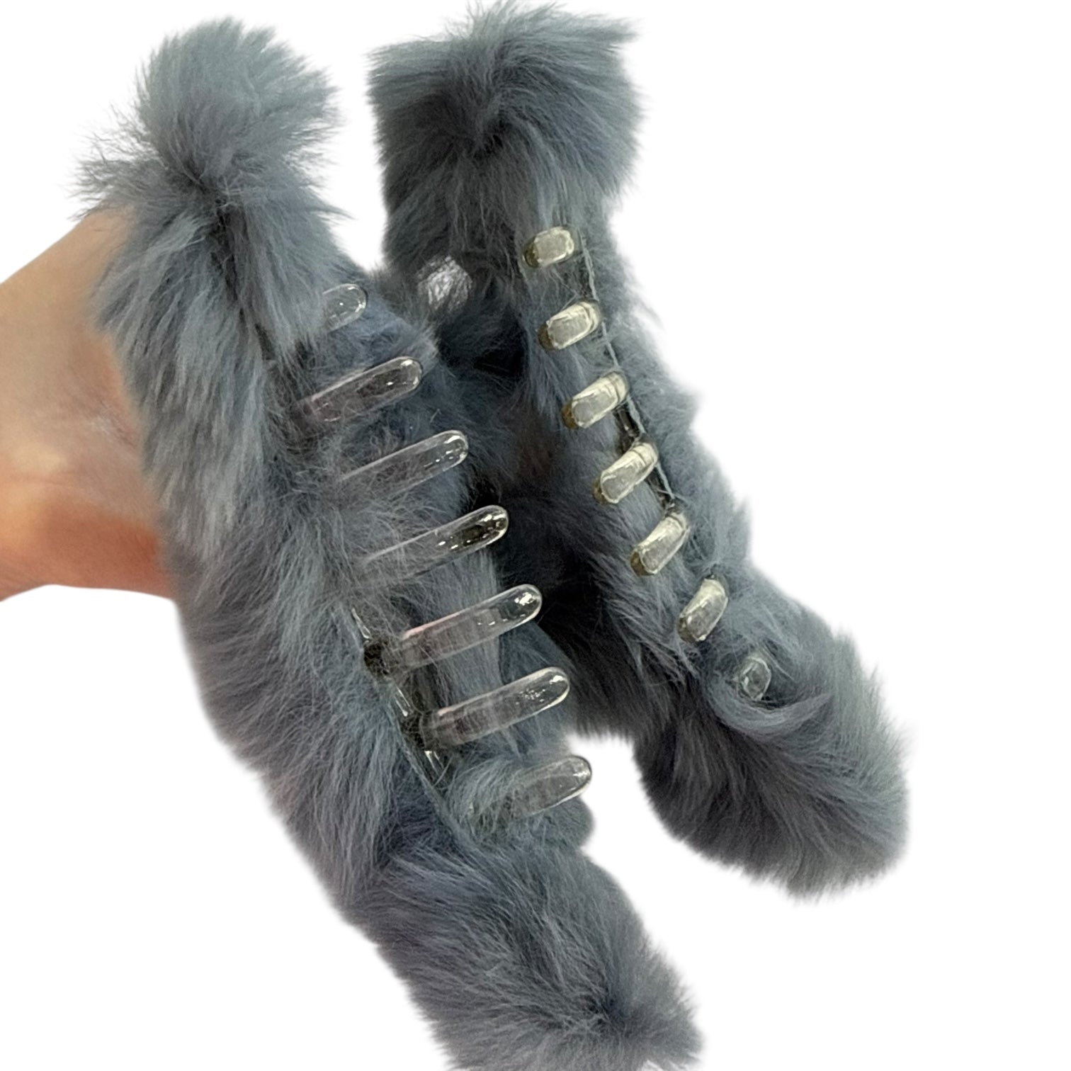 Gray fuzzy fur clip on a white background