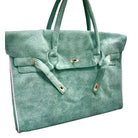 Green textured handbag with gold accents on a white background