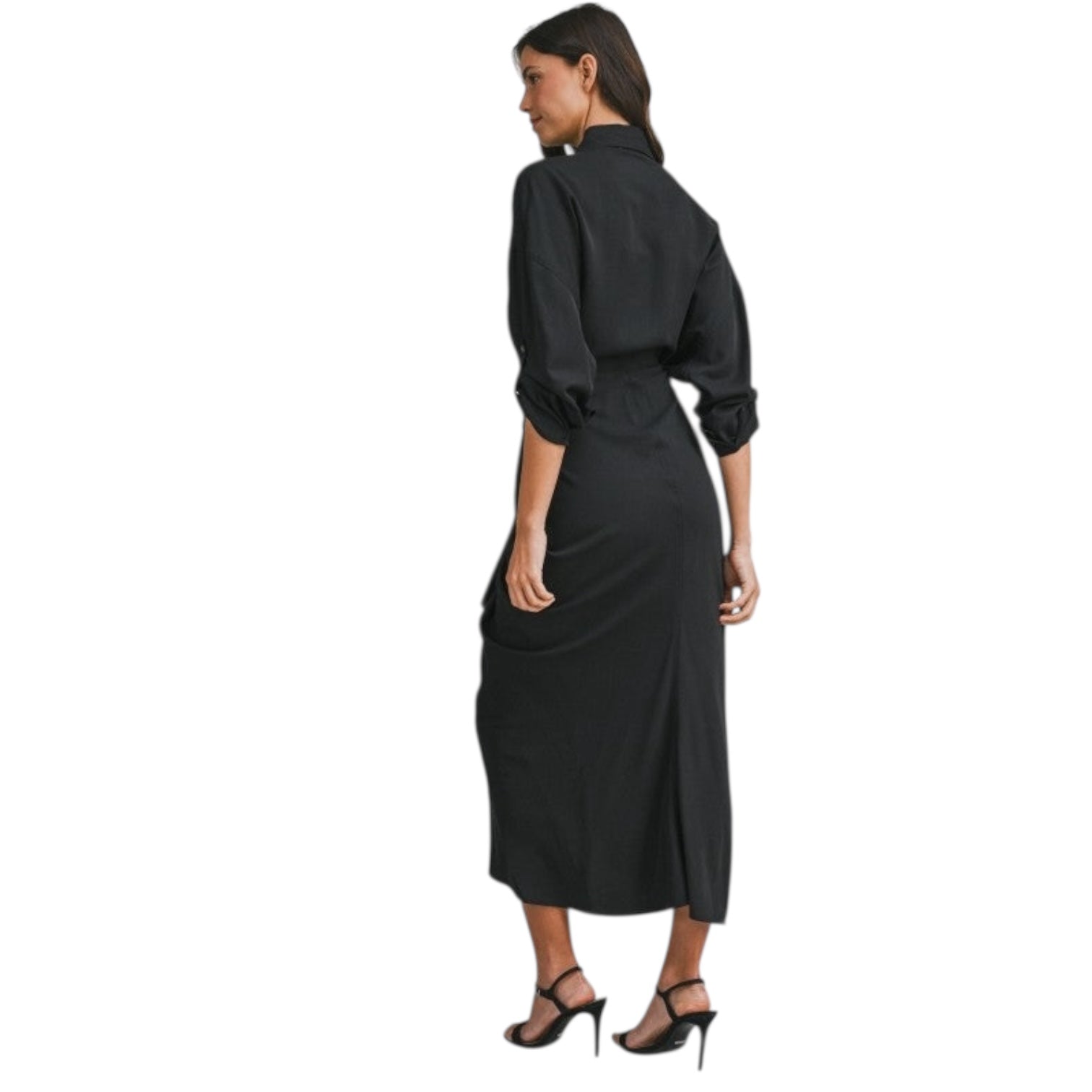 Woman wearing a black dress with a white background