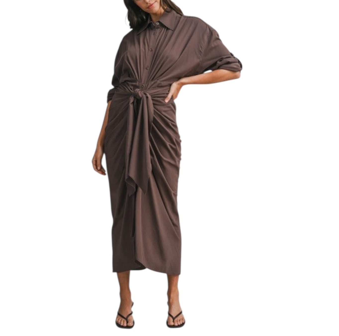 Woman wearing a brown dress with a white background